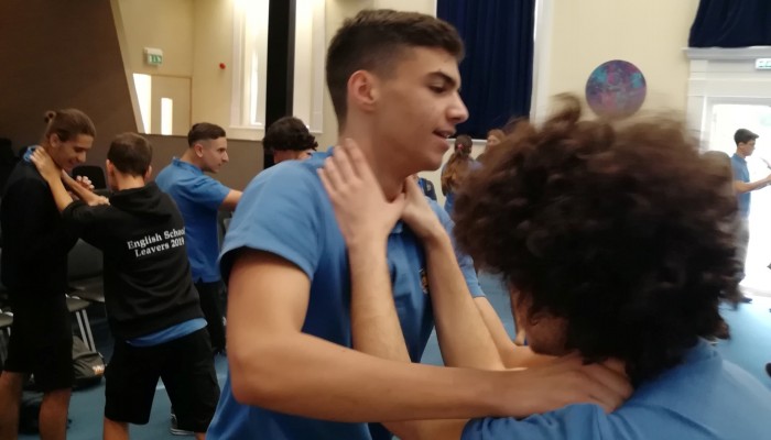 Year 7 PSHCE students get to grips with self-defense under the guidance of top martial arts expert.